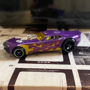 Vibrant Purple and Yellow Toy Car